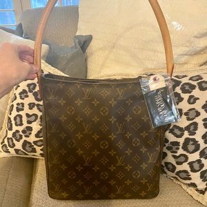 Vintage luxury 2001 monogram Louis Vuitton bag.